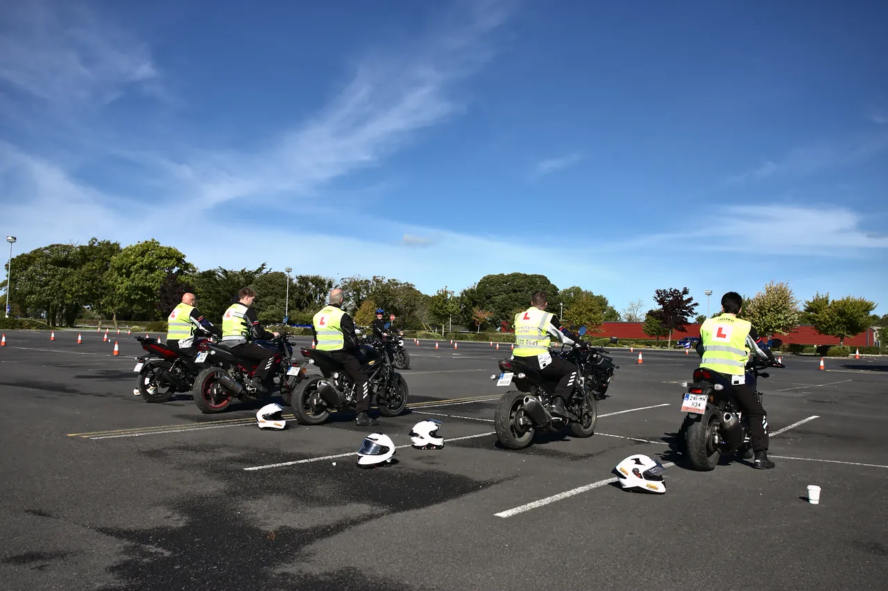 A group of learner riders on motorcycles during IBT training on the yard at Fairyhouse Racecourse, Ratoath