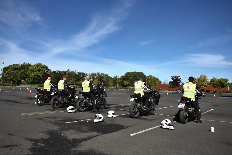A group of learner riders on motorcycles during IBT training on the yard at Fairyhouse Racecourse, Ratoath