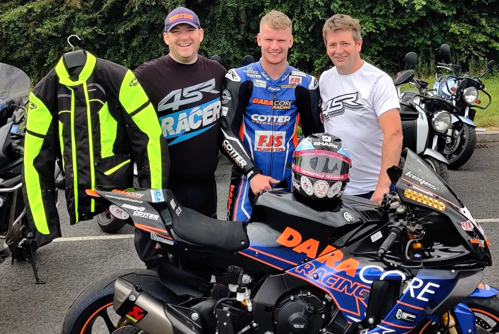 Meath Motorcycle Academy instructors with a rider and a race bike